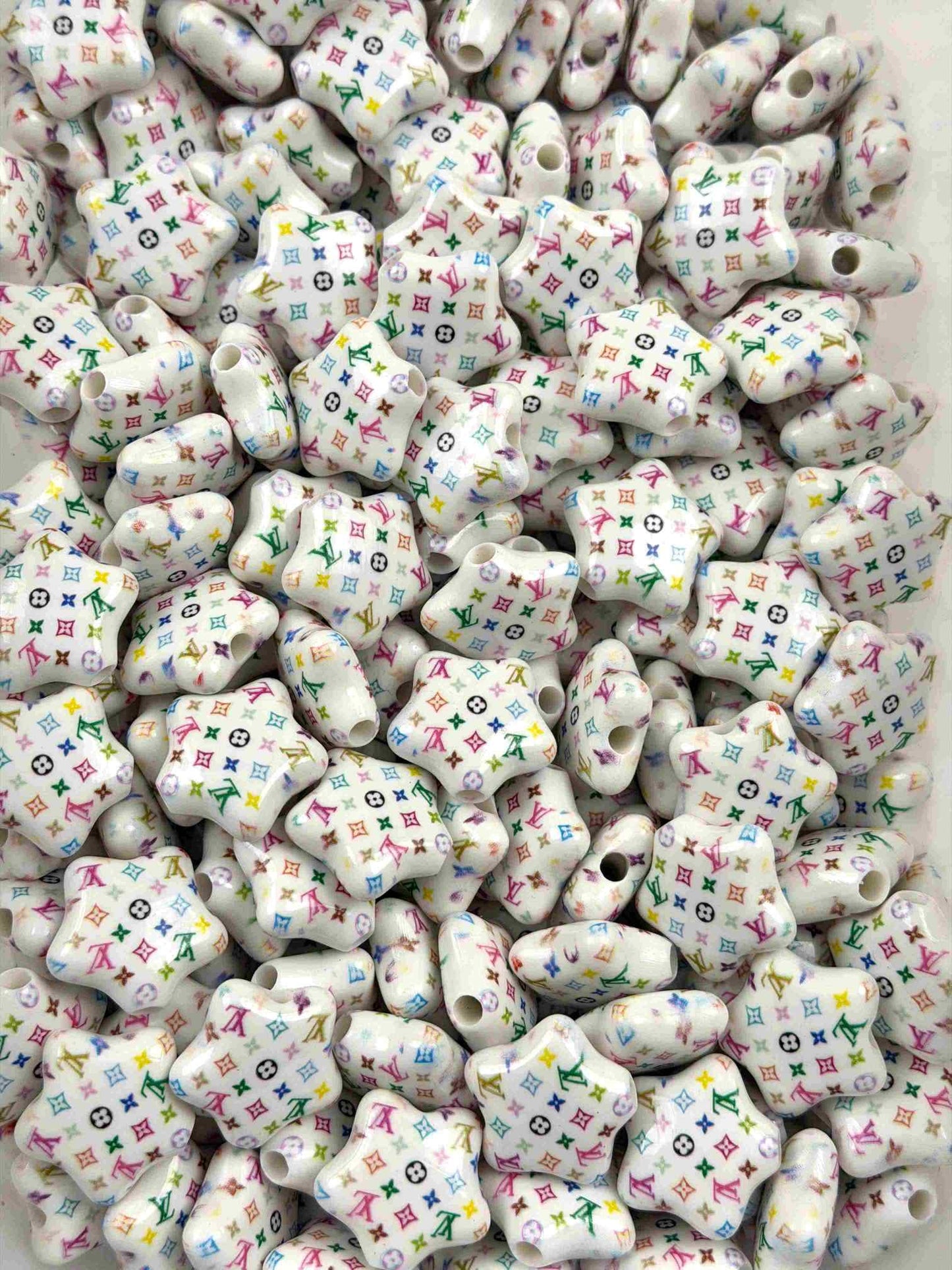 Designer star vv beads