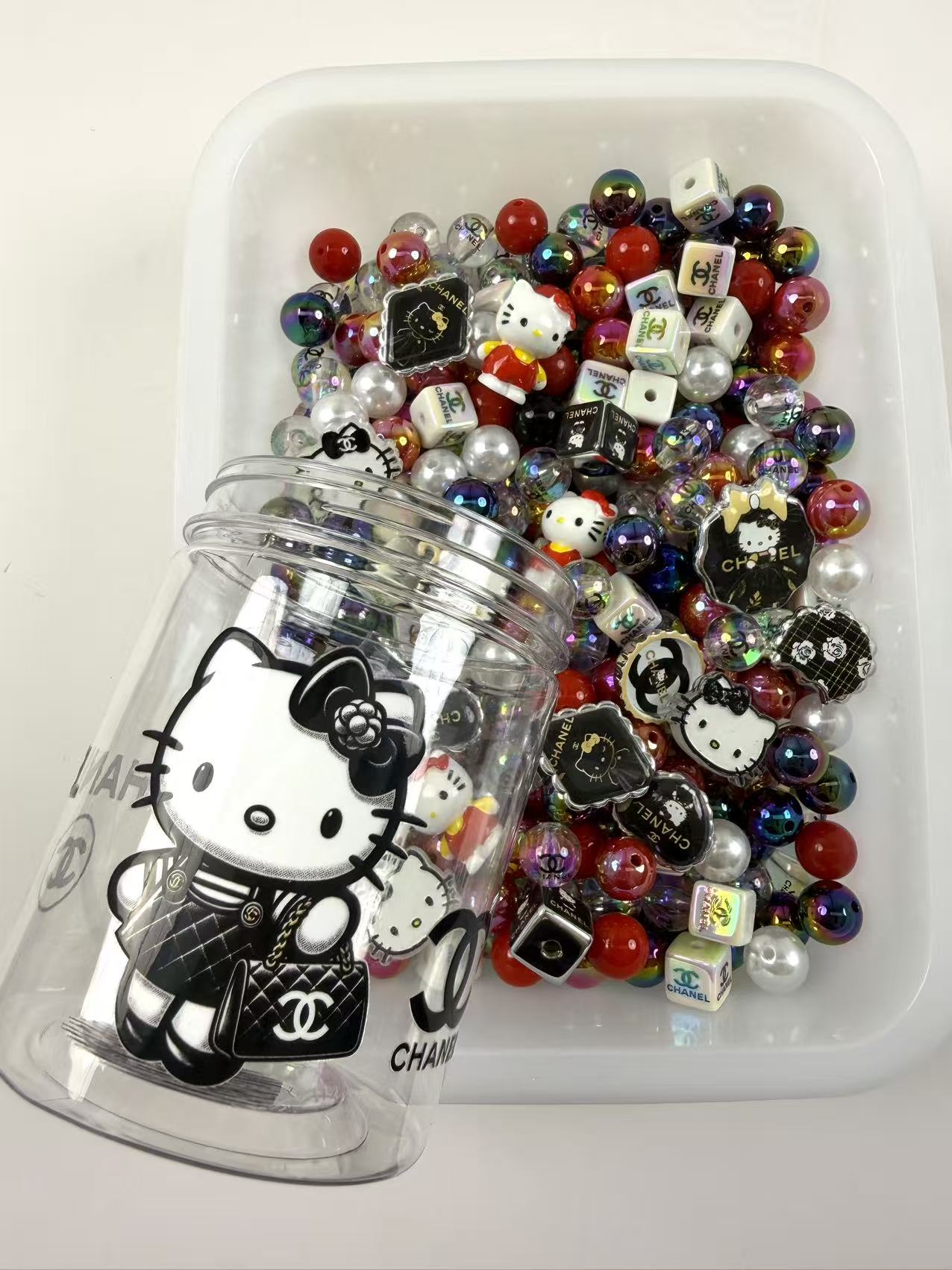 Acrylic bottle with designer beads