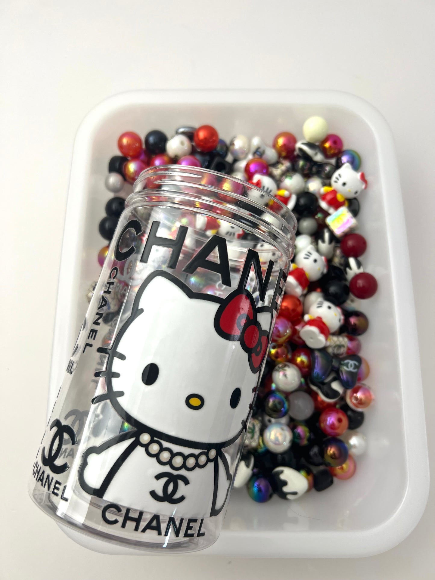 Acrylic bottle with designer beads