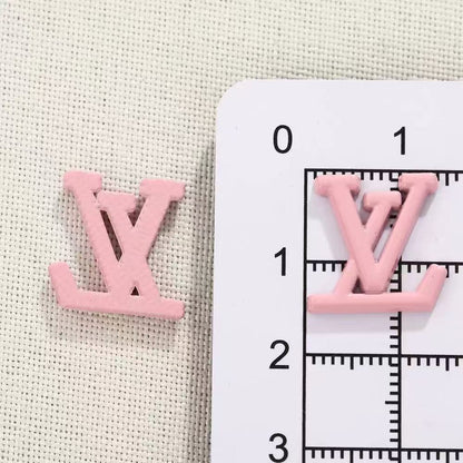 Small designer charms