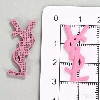 Small designer charms