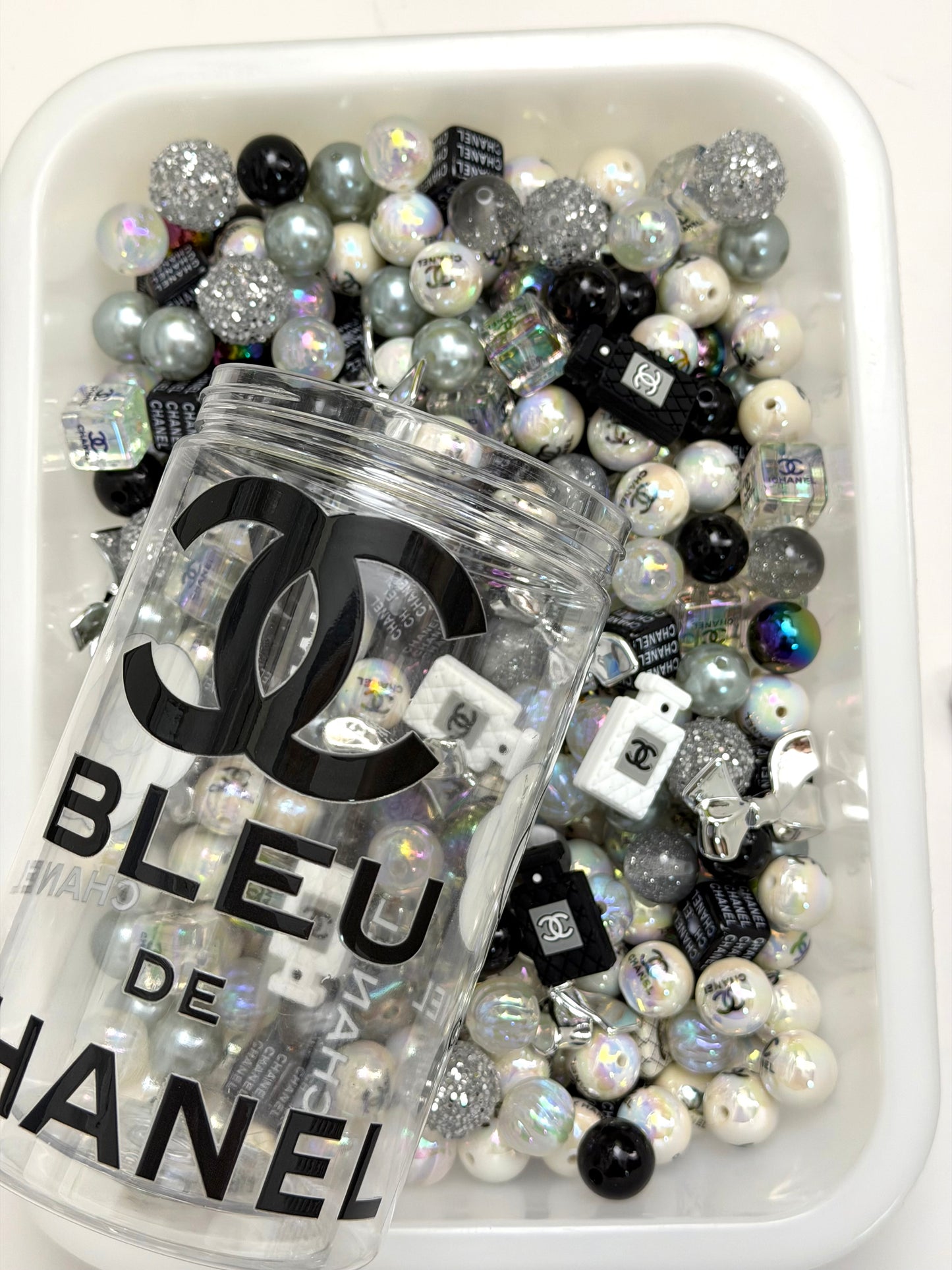 Acrylic bottle with designer beads