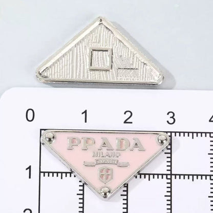 Small designer charms
