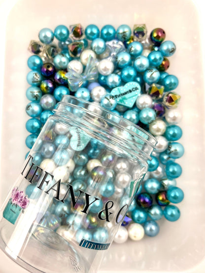 Acrylic bottle with designer beads
