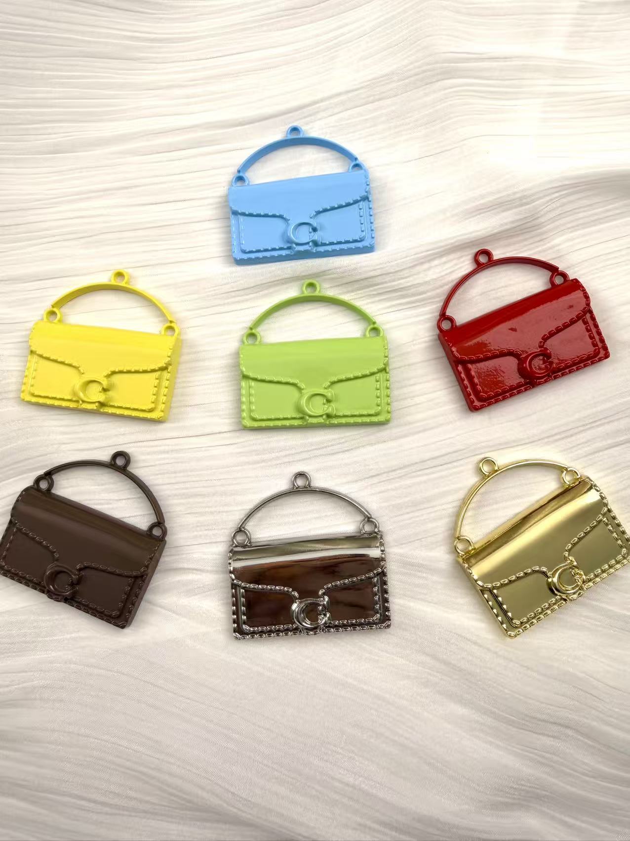 Big mental designer bags keychains