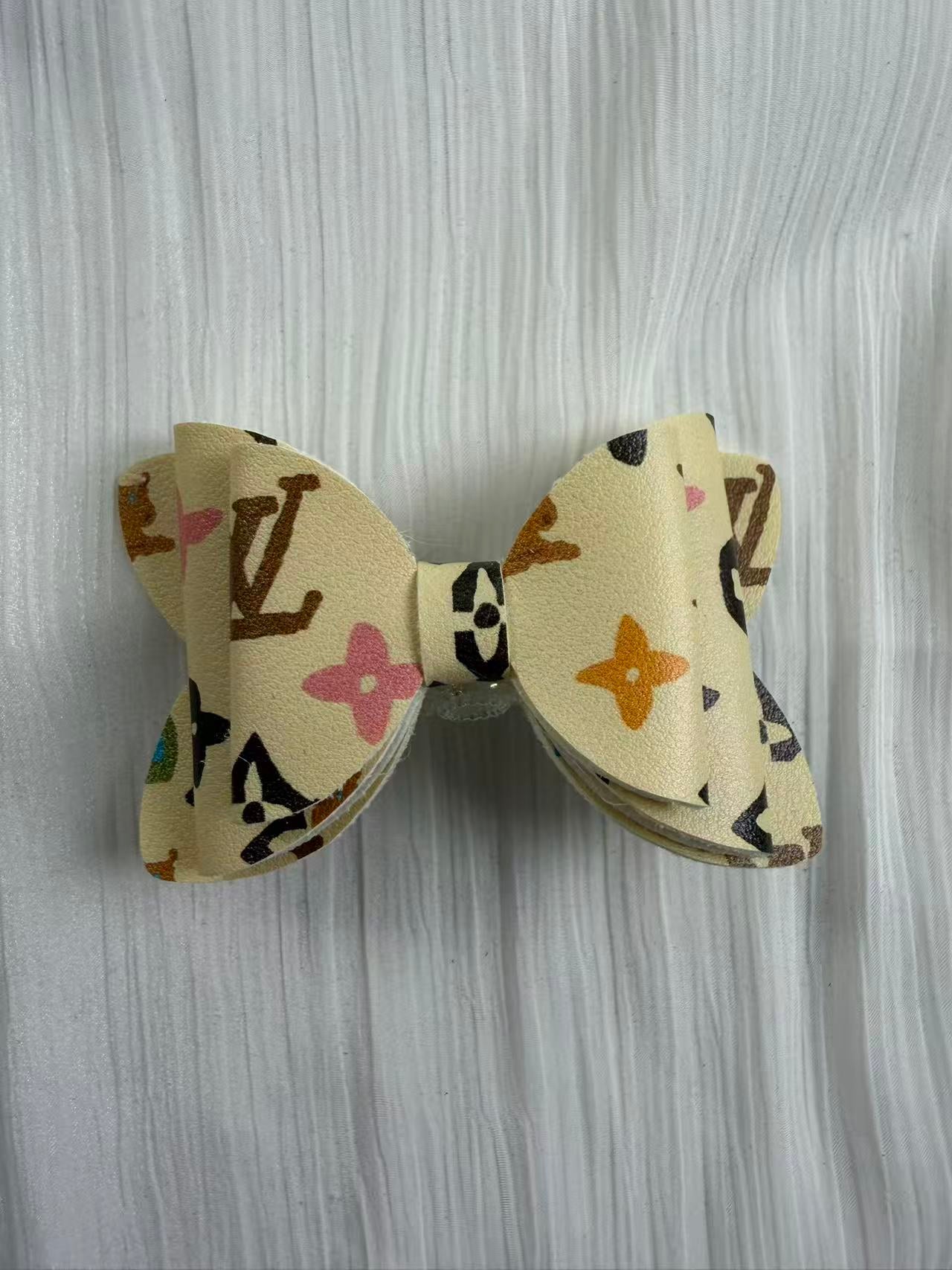 Designer leather Big bow beads
