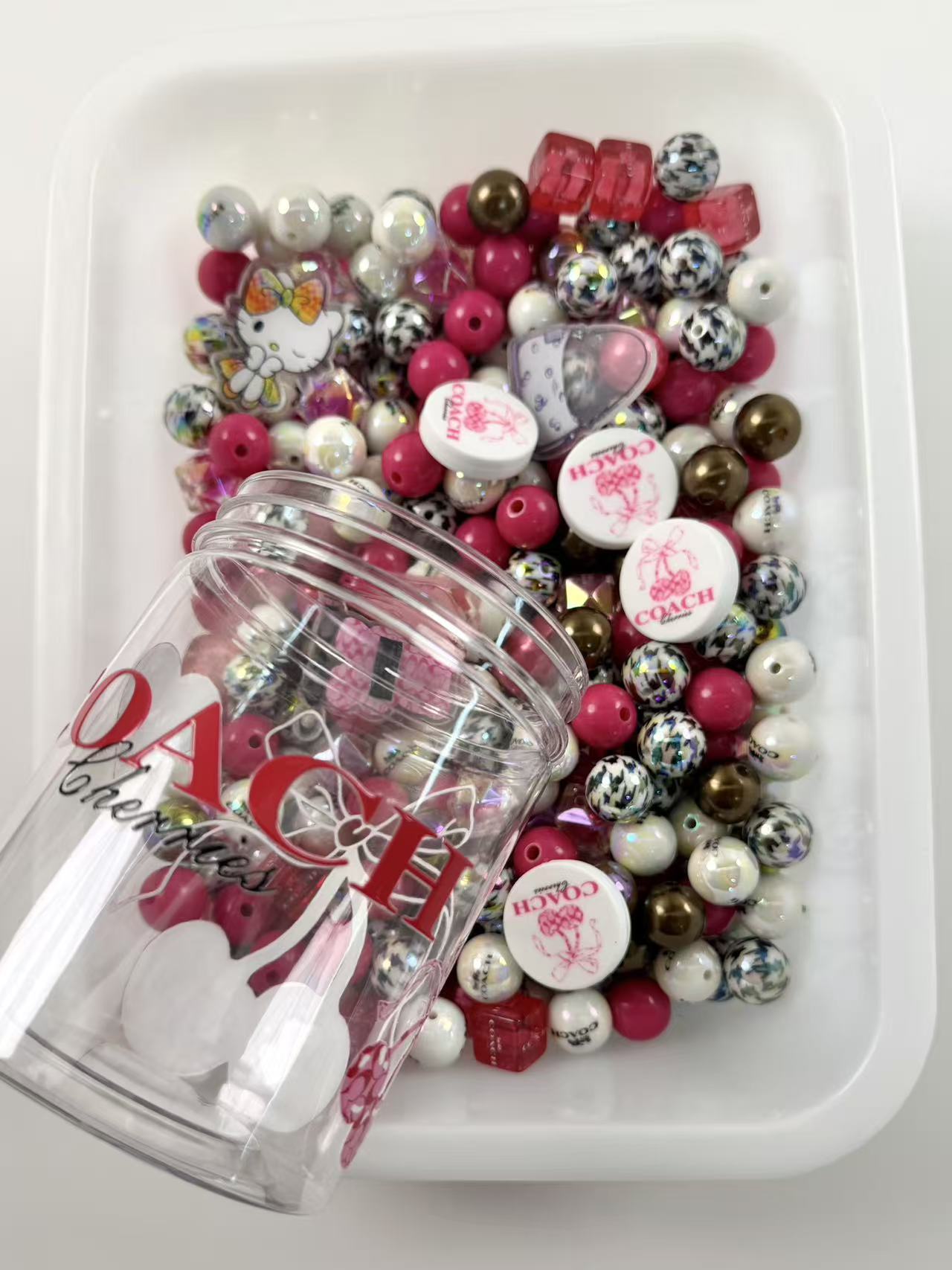Acrylic bottle with designer beads