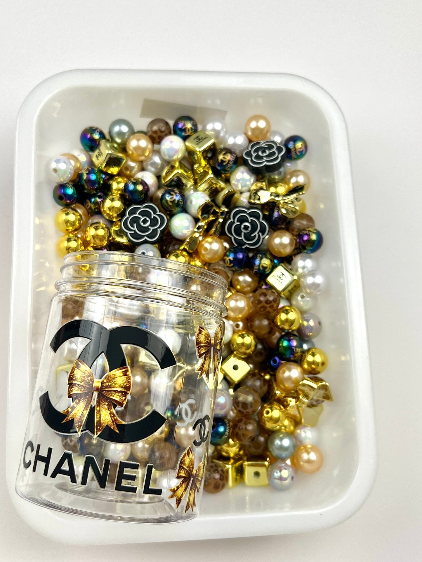 Acrylic bottle with designer beads