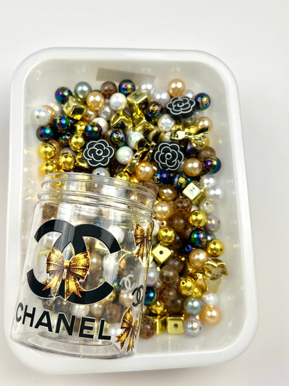 Acrylic bottle with designer beads
