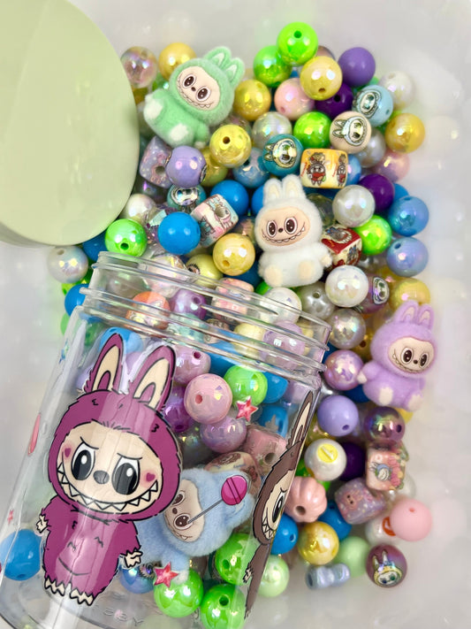 Acrylic bottle with designer beads