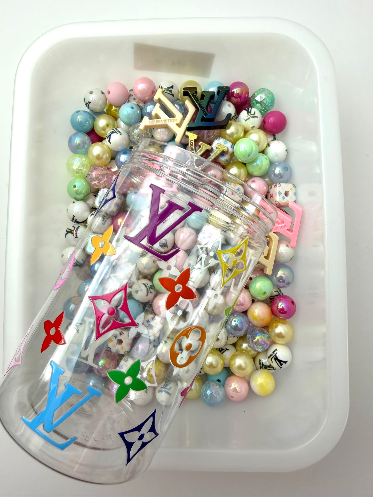 Acrylic bottle with designer beads
