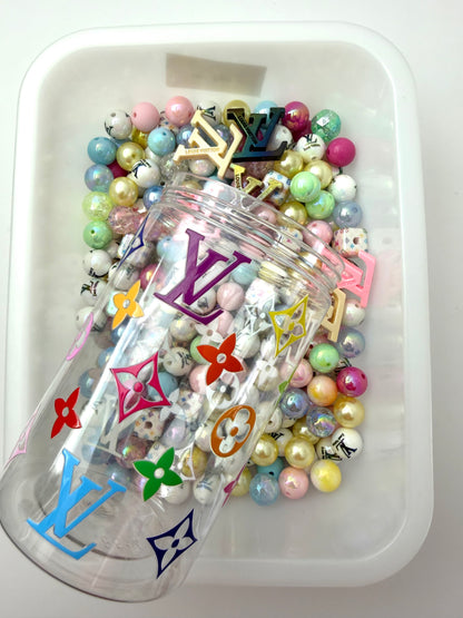 Acrylic bottle with designer beads