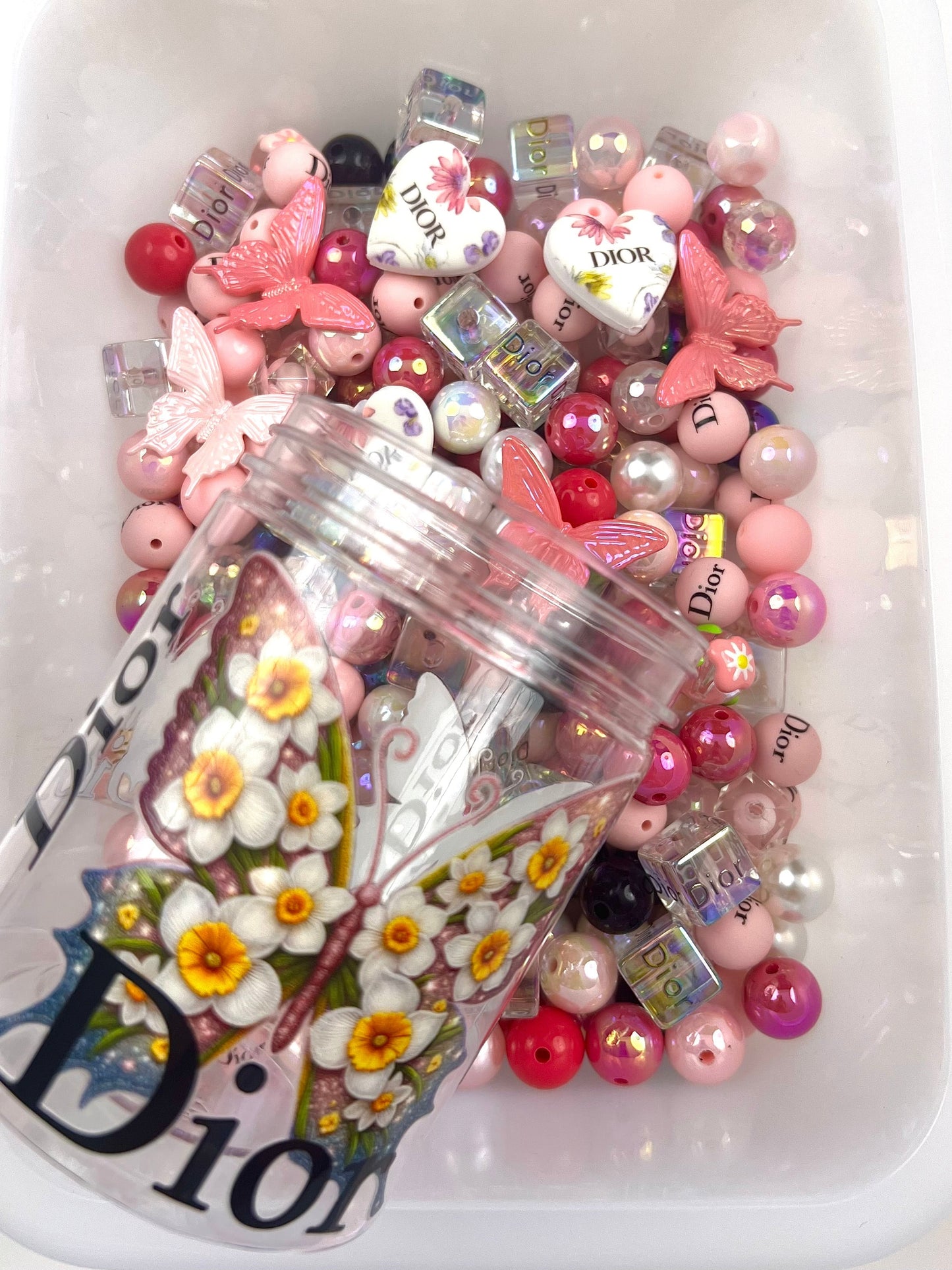 Acrylic bottle with designer beads