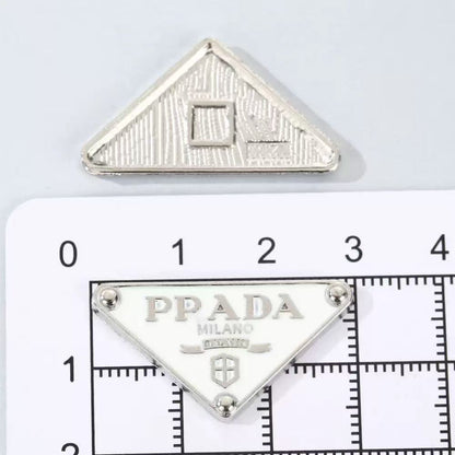 Small designer charms