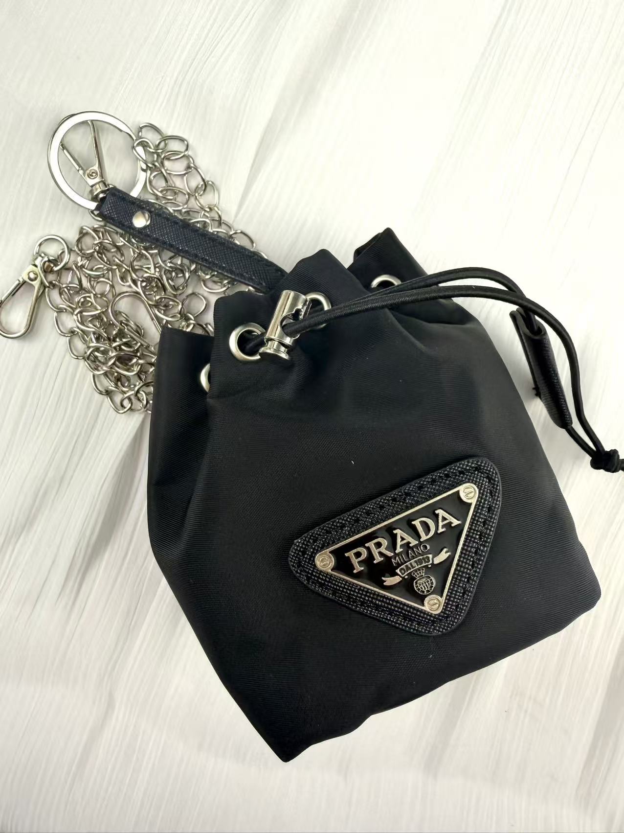 Small PRA bucket bags