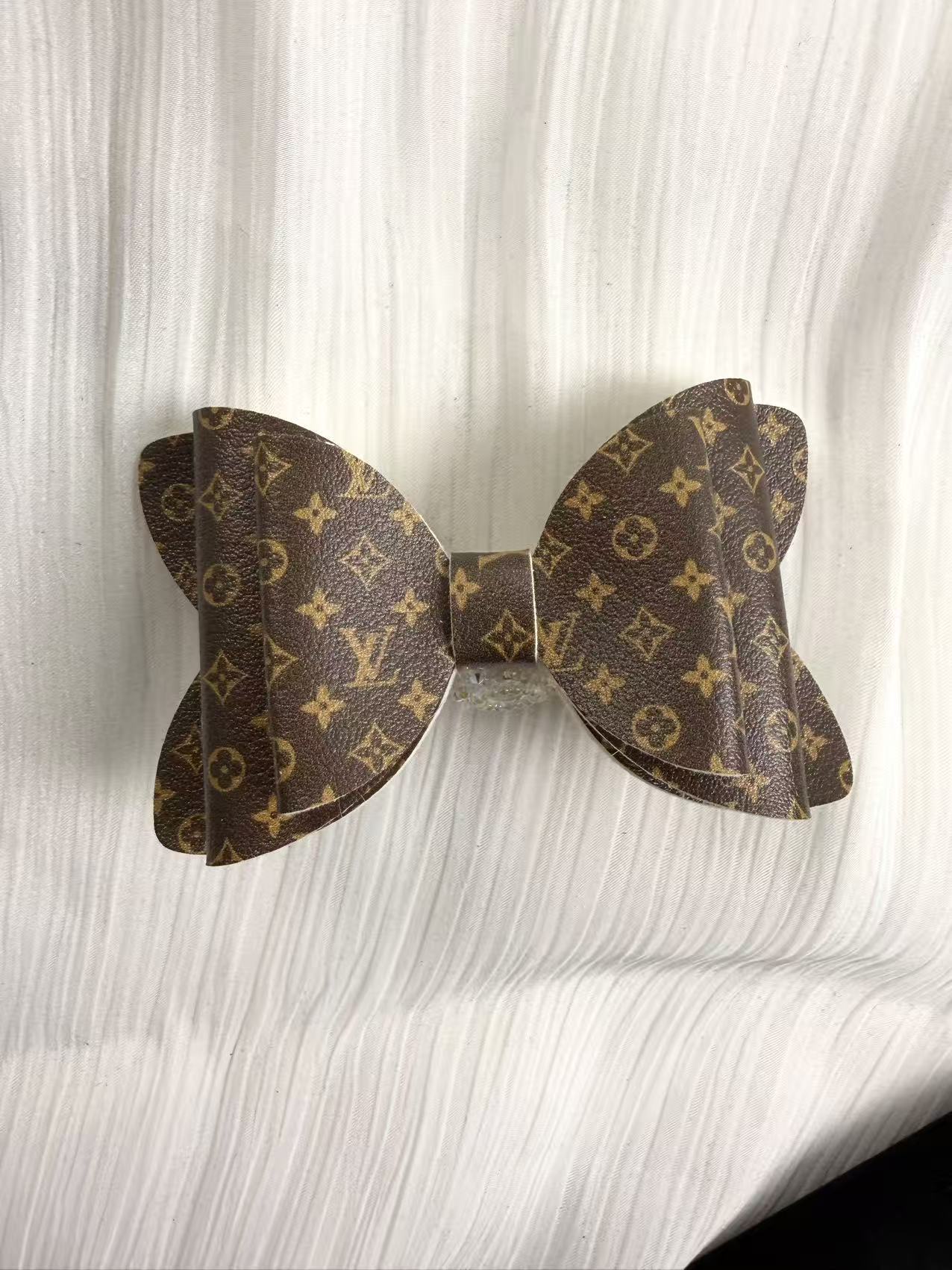 Designer leather Big bow beads