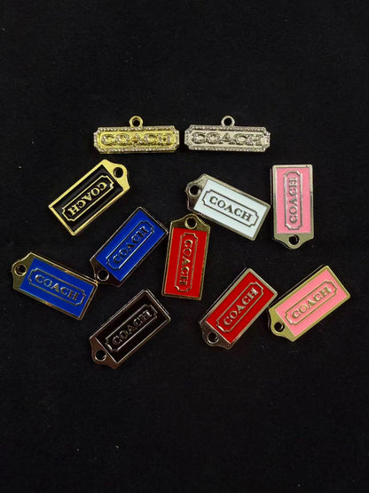 coach charms pendants