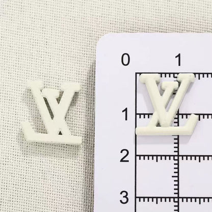 Small designer charms