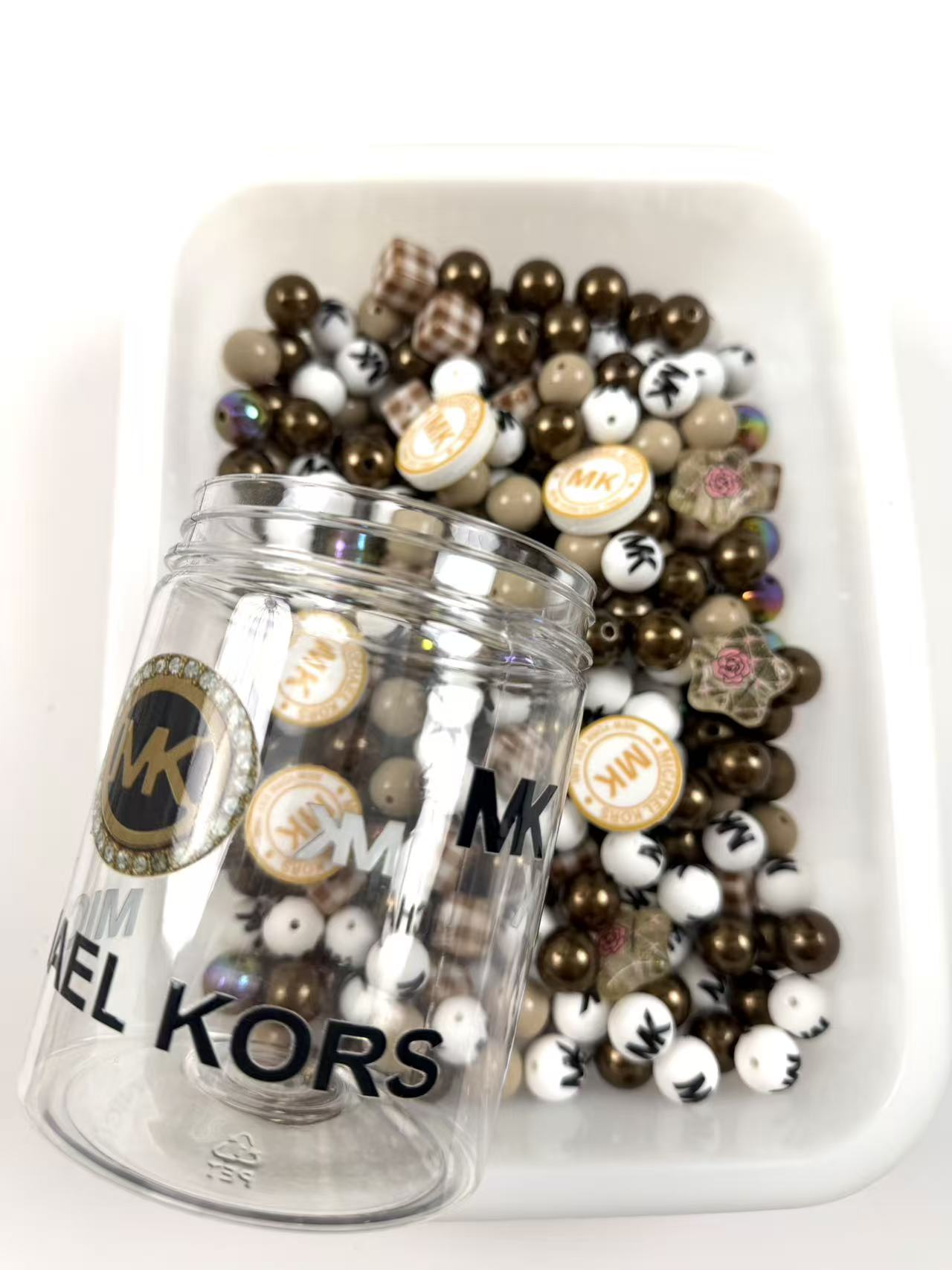 Acrylic bottle with designer beads